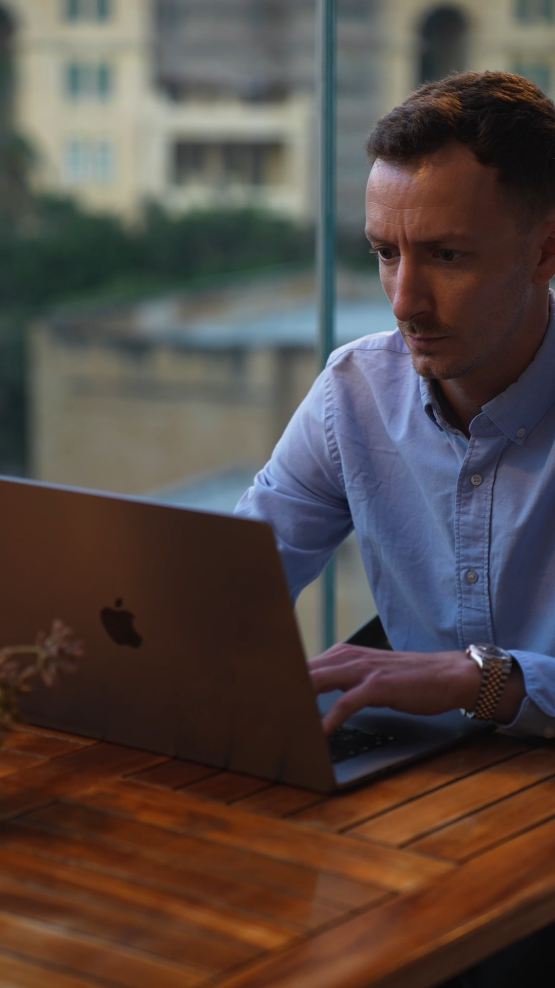 Luigi Fiano working on his laptop